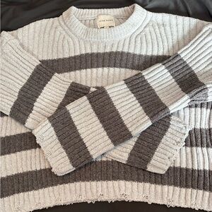 Pink Rose Beige Label on Light Gray Knit Garment